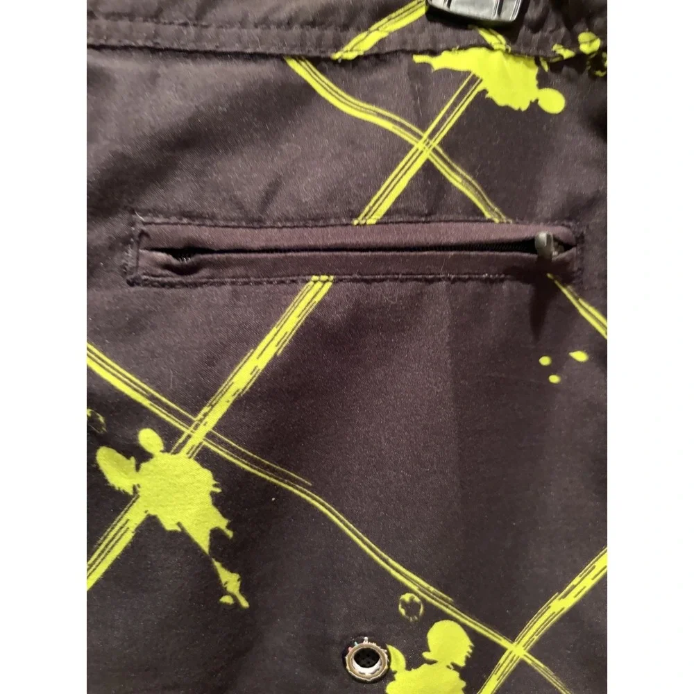 Maui and Sons black swim trunks with neon yellow/green graphic pattern Size 34